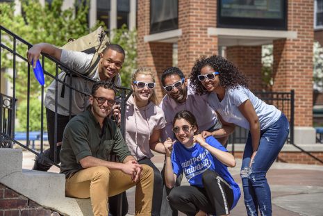 group of students celebrating in the quad