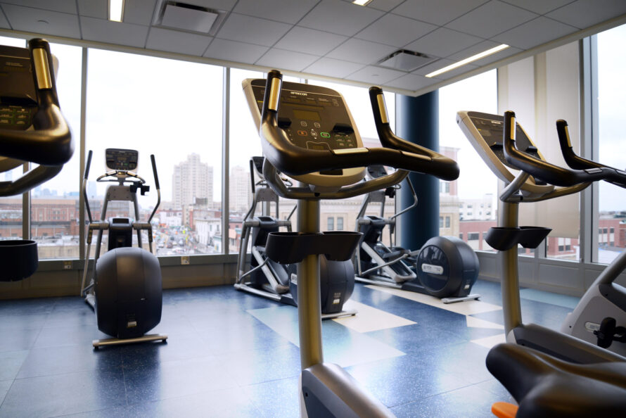 Image of ellipticals in a gym.