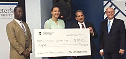 staff with donated check