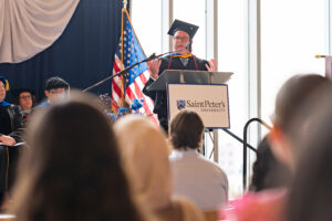 photo of Edward Hahn Jr., M.D. ’04 at the podium