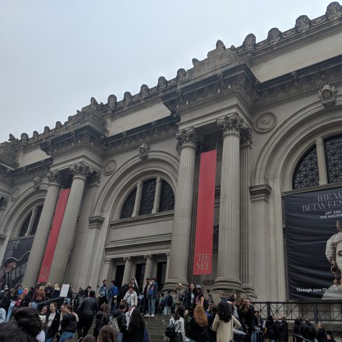 The facade of the Metropolitan Museum of Art on Fifth Avenue on a gray day in April.